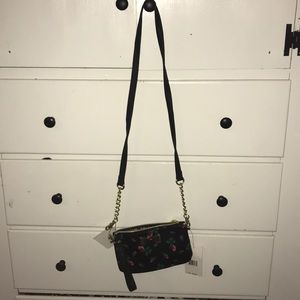 Betsey Johnson purse with charging cable